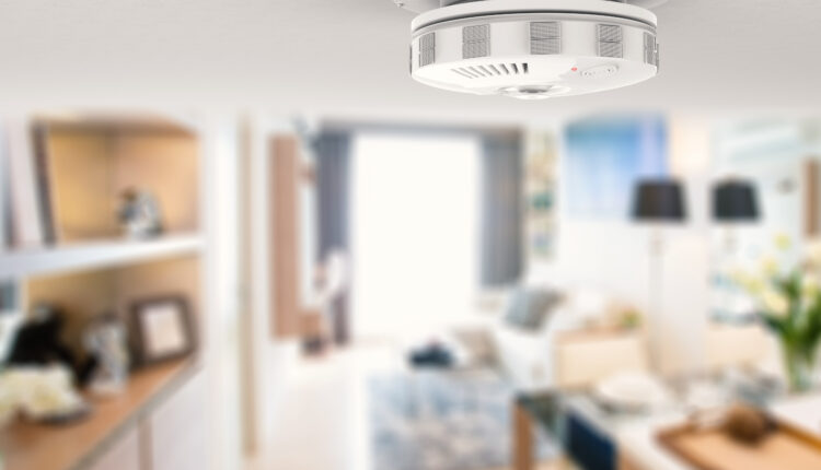decorative image of a 3d rendering smoke detector on ceiling