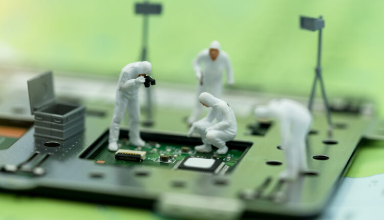 Decorative image of miniature people searching for clues o a crime